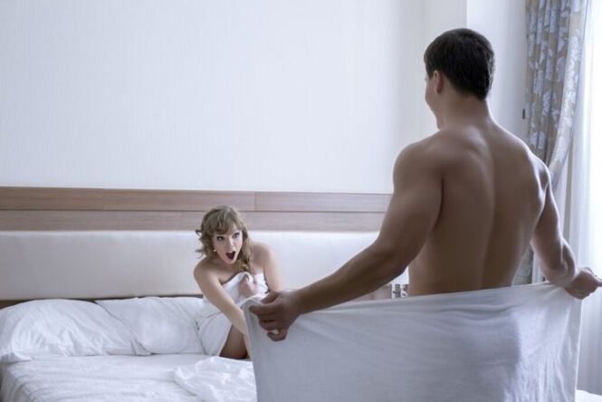 the woman admires the size of the penis